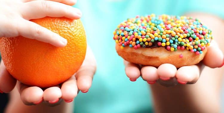 Child Choosing to Eat Healthy Sugars Over Added Sugars