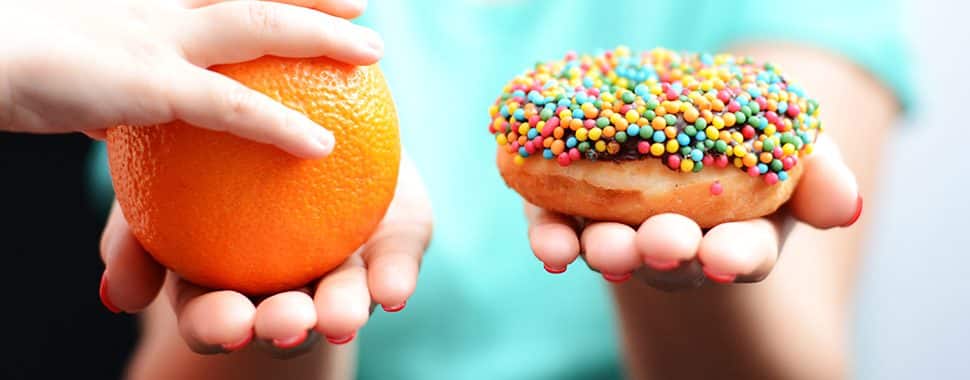 Child Choosing to Eat Healthy Sugars Over Added Sugars