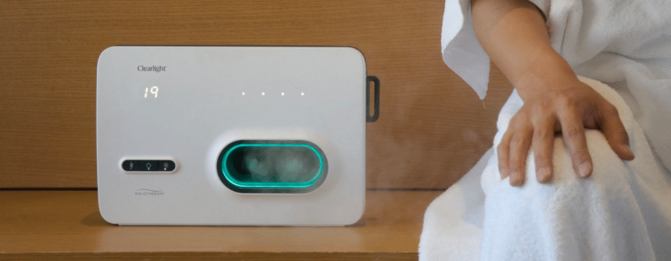 Person Using Clearlight Halotherapy Device in Infrared Sauna