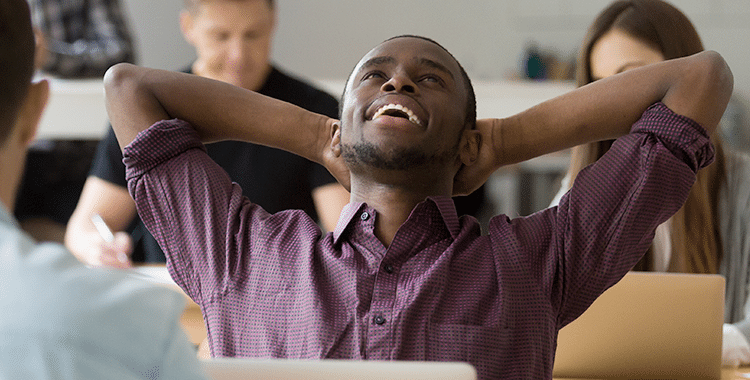 Happy Man in Positive Work Environment