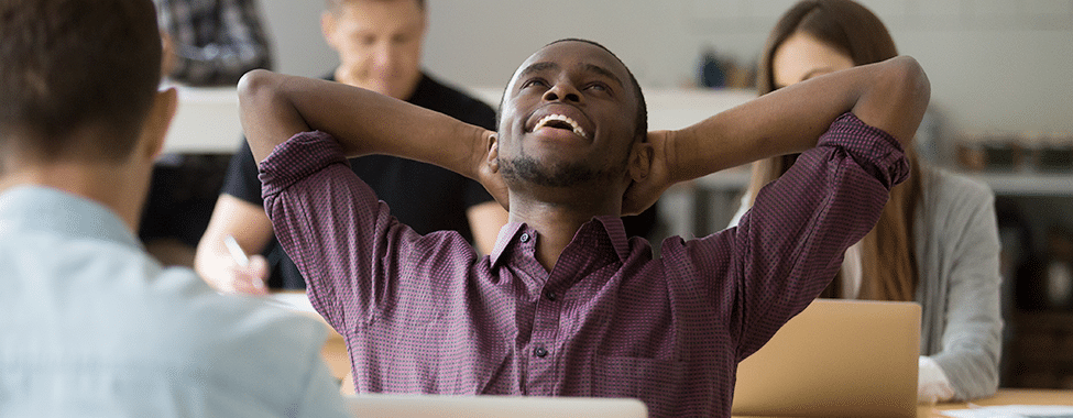 Happy Man in Positive Work Environment