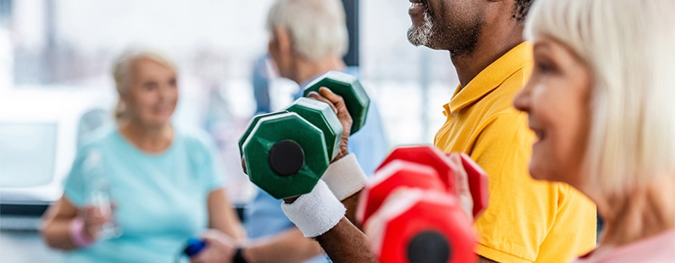 Older Couple Working Out to Naturally Alleviate Pain