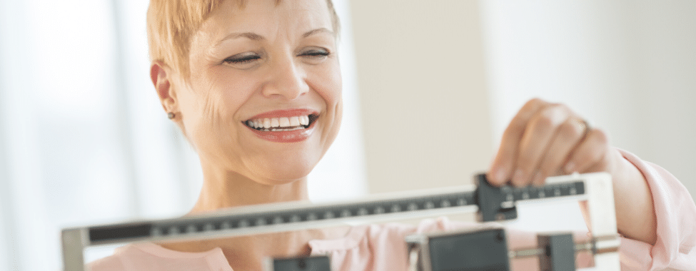 Woman Checking Healthy Weight During Menopause