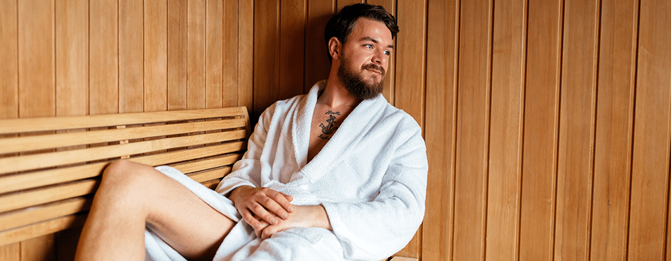 Man Using a Sauna After Working Out