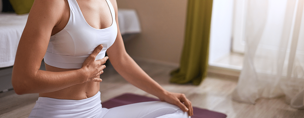 Woman practicing breathing exercises