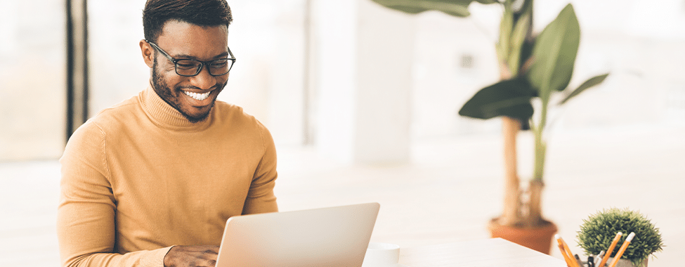 Happy man looking up self improvement ideas