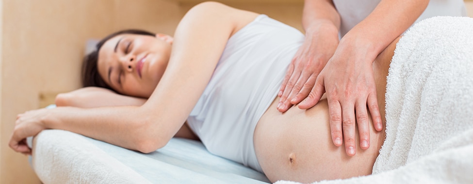 Pregnant woman getting a prenatal massage