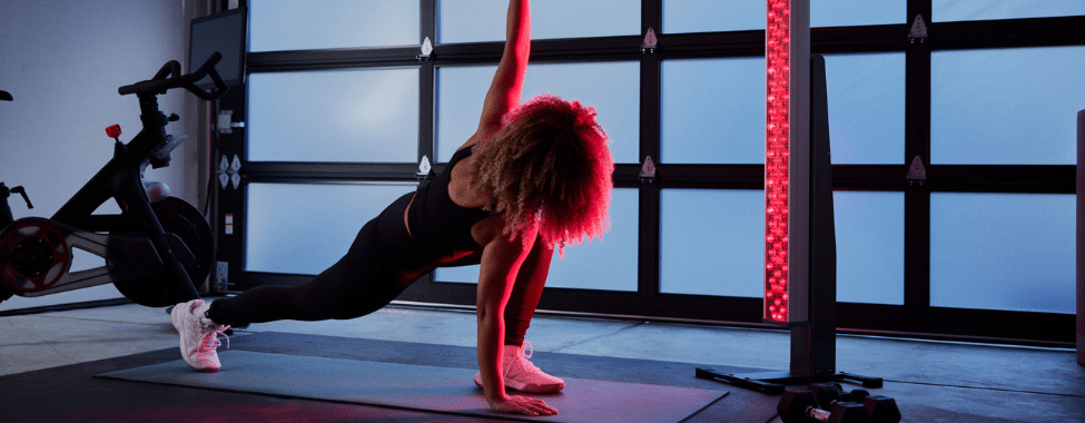 Athlete Using Clearlight Red Light Tower for Athlete Recovery