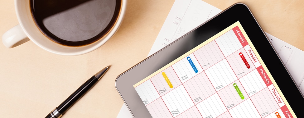 Digital Calendar and Coffee for Daily Routine Working from Home