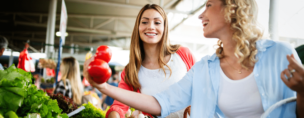 Friends Shopping for Healthy Spring Produce at Market