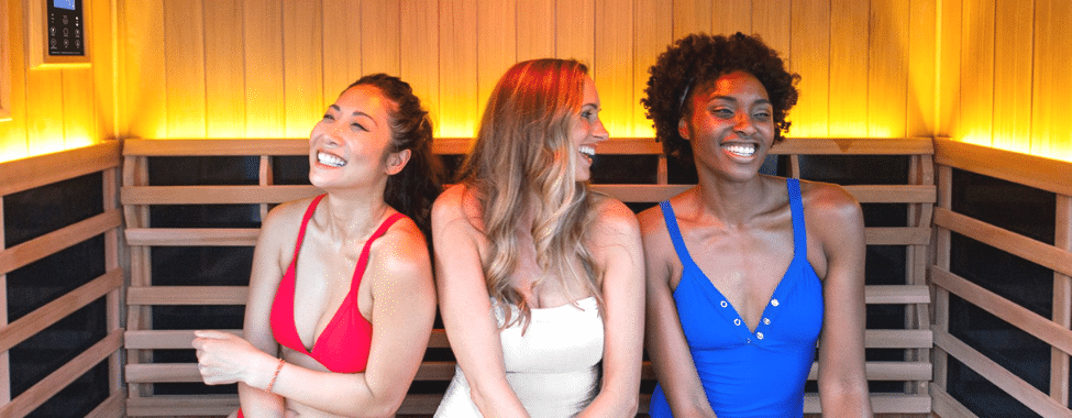 Friends Enjoying Infrared Sauna Health Benefits