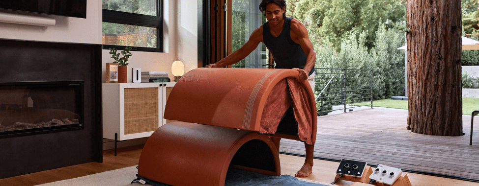 Man assembling Curve infrared sauna dome