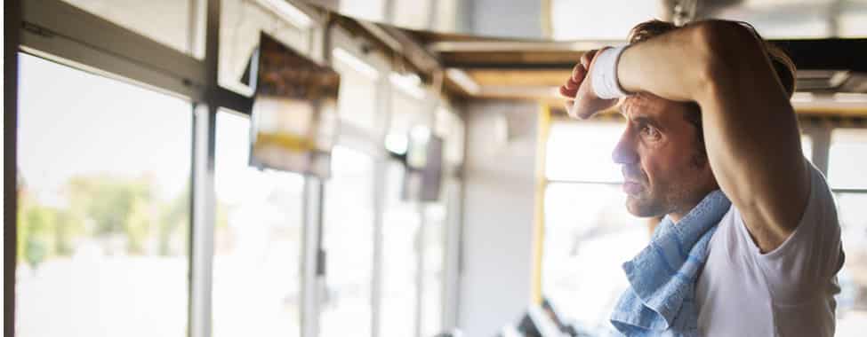 Man Sweating at Gym for Heat Shock Protein Production